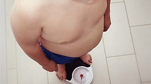 Image for Slimmer so big he got stuck in football turnstile