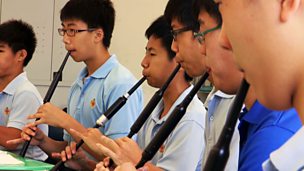 Image for The Boys' Brigade in Singapore learn to play the bagpipes