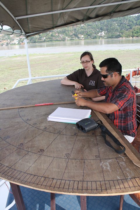 Lucy Boddam-Whetham and Abdul Wakid at dolphin observation station