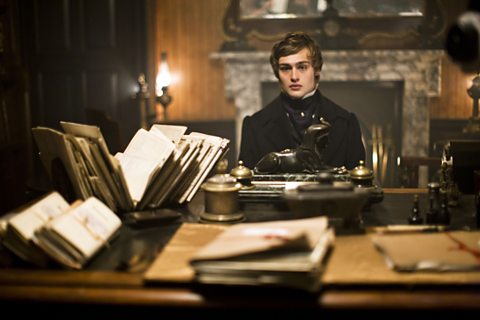 Pip (Douglas Booth) visits Jaggers' office