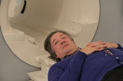 Stephen Fry about to enter an MRI Scan