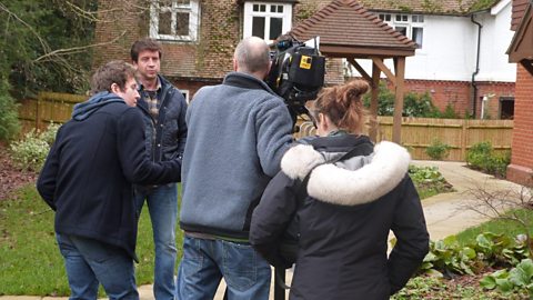 The crew setting up to film