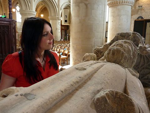 Dr Janina Ramirez at the Malmesbury Abbey with King Athelstan’s tomb
