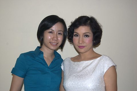 Presenter Jennifer Pak with diva My Linh at Hanoi Opera House