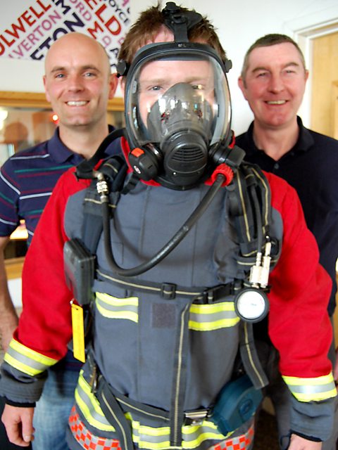 Richard 'kitted up' with firefighters Lee Newbold and Dave Needham 