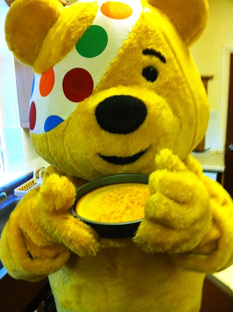 Pudsey helps in the kitchen