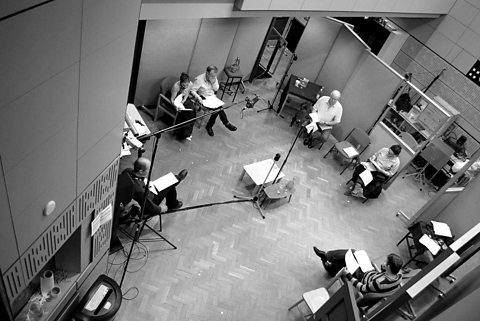 The cast in the studio