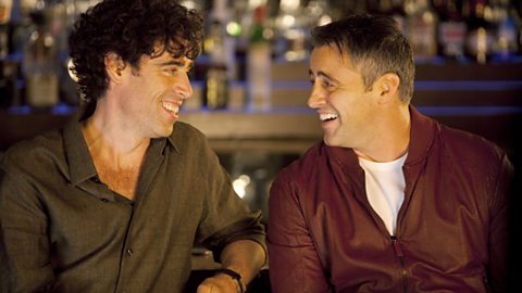 Matt and Sean bonding over a drink