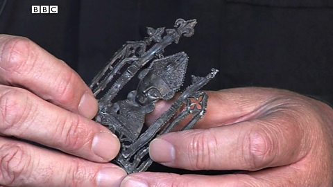 The Archbishop holding the Pilgrim's Badge