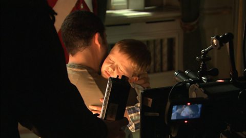 We get in close on a touching moment