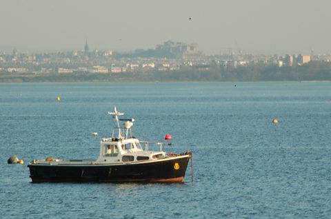 From the headland at Dalgety Bay you can see Edinburgh in the distance
