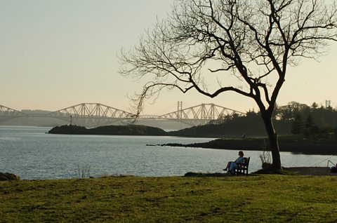 Looking across from Dalgety Bay to the Forth Bridge on a sunny evening in Spring