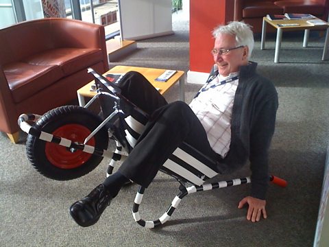 John Holmes ditches his bike for the barrow!