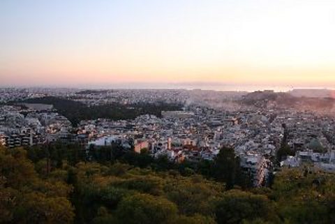 View of Athens with burning fires after a day of protests
