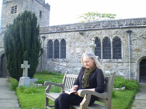 Presenter Christine Finn outside St Michael and All Angels, Hubberholme