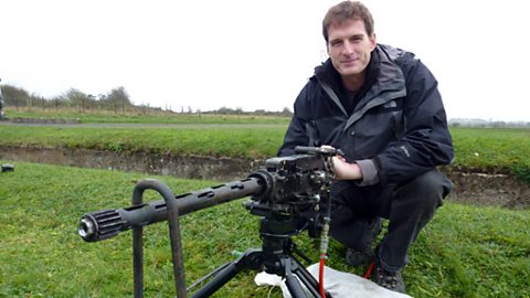 Dan prepares to fire the Browning, 70 years after the war
