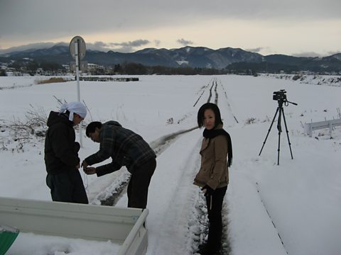 Presenter Mariko Oi prepares to interview a local carrot farmer