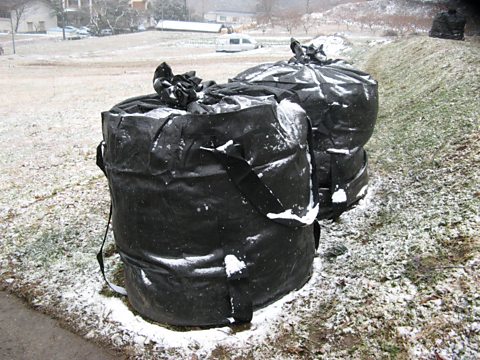 Bags of low level contaminated soil and vegetation