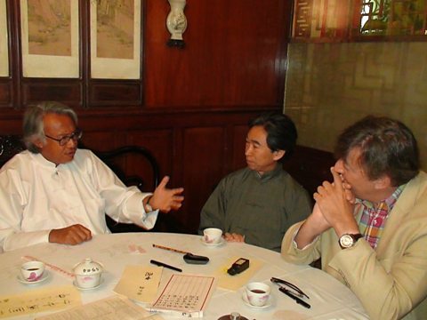 Stephen Fry with Sir David Tang and Johnson Chang
