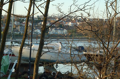 Houses look onto the section of beach which has been closed 