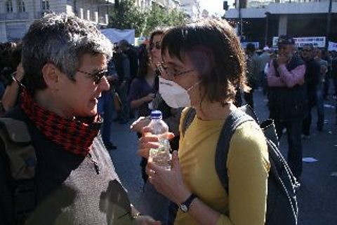 Presenter Maria Margaronis interviewing in Syntagma Sq on day 2 of the General Strike, Athens