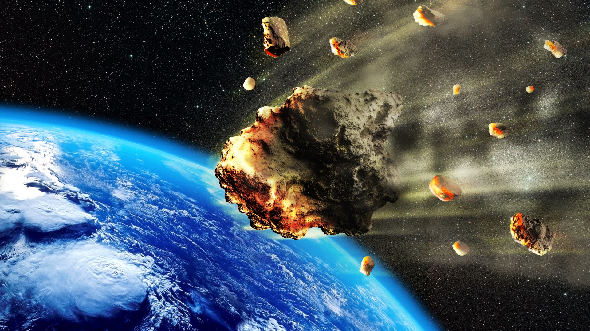 3D rendering of a swarm of Meteorites or asteroids entering the Earth atmosphere (Credit: ratpack223/Getty Images)