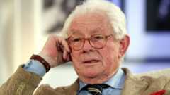 Hamilton posing before the opening of an exhibition with his pictures in Stuttgart, Germany in 2007