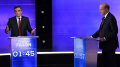 The two finalists in France's conservative presidential primary, Francois Fillon (L) and Alain Juppe, take part in the first televised debate between the two remaining candidates for the right-wing Republicans party primary in Paris on 24 November 2016, ahead of the 2017 presidential election