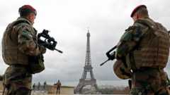 French army paratroopers patrol near the Eiffel tower in Paris, France, March 30, 2016