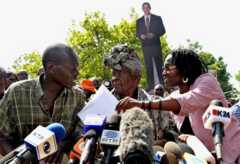 The half-brother of US President-elect Barack Obama, Said Obama, his grandmother Sarah Obama and his half sister Auma Obama, get ready for a press conference on November 5, 2008 in the village of Kogelo,