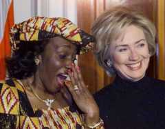 Nana Konadu Agyeman-Rawlings (L), wife of Ghana's President Jerry John Rawlings, speaks with First Lady Hillary Rodham Clinton (R) during the receiving line at the official state dinner at the White House 24 February.