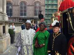 Ambassador Mohammed Sheriff, his wife and a member of the royal household pose for a photo outside their horse-drawn carriage