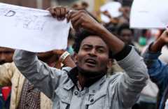 A protester chants slogans during a demonstration over what they say is unfair distribution of wealth in the country at Meskel Square in Ethiopia"s capital Addis Ababa, August 6, 2016.