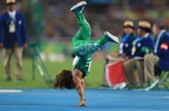 onye performs a cartwheel after winning