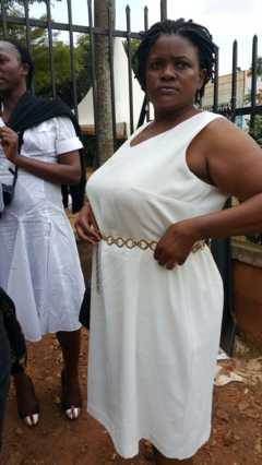 female protesters in white dresses