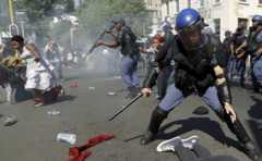 Students run for cover as police fire stun grenades and rubber bullets in an attempt to disperse them, during their protest for free education in Johannesburg, South Africa, Wednesday, Sept. 21, 2016.