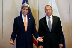 Secretary of State John Kerry (L) and Russian Foreign Minister Sergei Lavrov