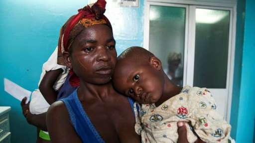 Mother and child at Angolan clinic