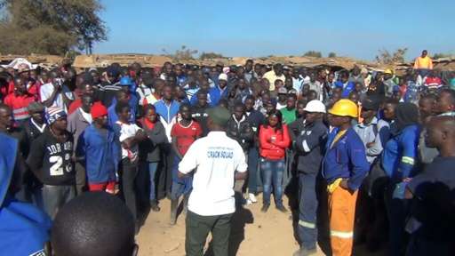Zambian police have fired tear gas at workers who were protesting for higher salaries at a cement factory owned by Nigerian billionaire Aliko Dangote
