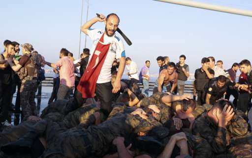 Surrendered Turkish soldiers who were involved in the coup are beaten by a civilian on Bosphorus bridge in Istanbul, Turkey, July 16, 2016