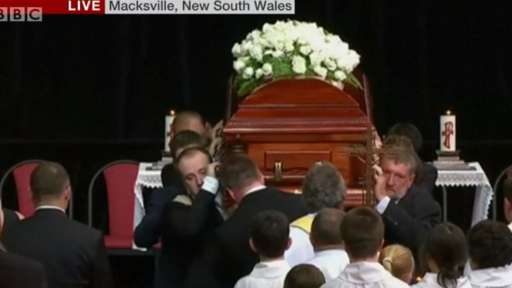 Phillip Hughes's casket is led away