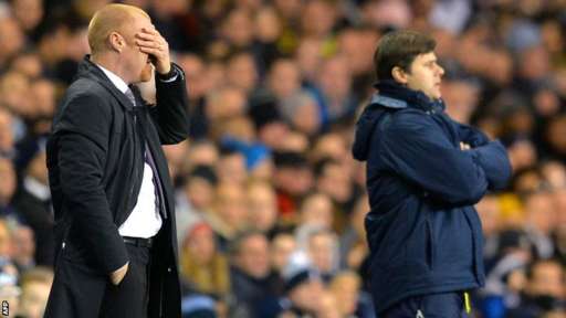 _80277001_dyche_hand_afp.jpg