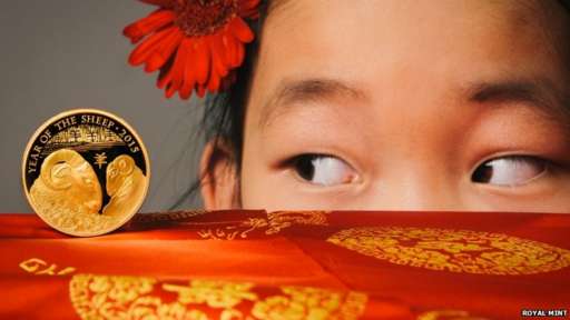 Year of the Sheep
The Royal Mint has issued this photo Lillian Sun, aged six, from Mengis Dance School in Battersea, south London, with its Lunar Year of the Sheep commemorative coin. Chinese New Year is celebrated from Thursday until 22 February.