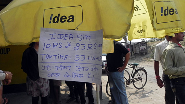 A dealer of pre-paid mobile SIM cards advertises the latest offer