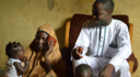 Yahaya Abdul-Rahman and his wife Salamatu listen to a BBC Media Action show in Nigeria.