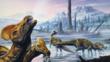 A group of Corythosaurus dinosaurs on a frozen landscape