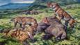 A group of mammal-like reptiles eating a dicynodont therapsid