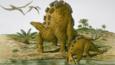 Wuerhosaurus adult and young by a pool