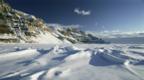 The frozen winter sea ice and cliffs of the Canadian Arctic