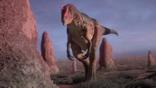 Allosaurus in a dry and sandy landscape